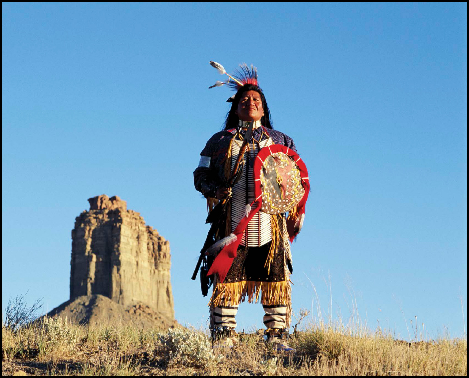 A chief of the Ute people stands before Chimney Rock in Ute National Park in - photo 4