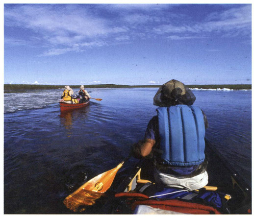 Solo Either to paddle by oneself or a canoe designed for one paddler Stern - photo 3