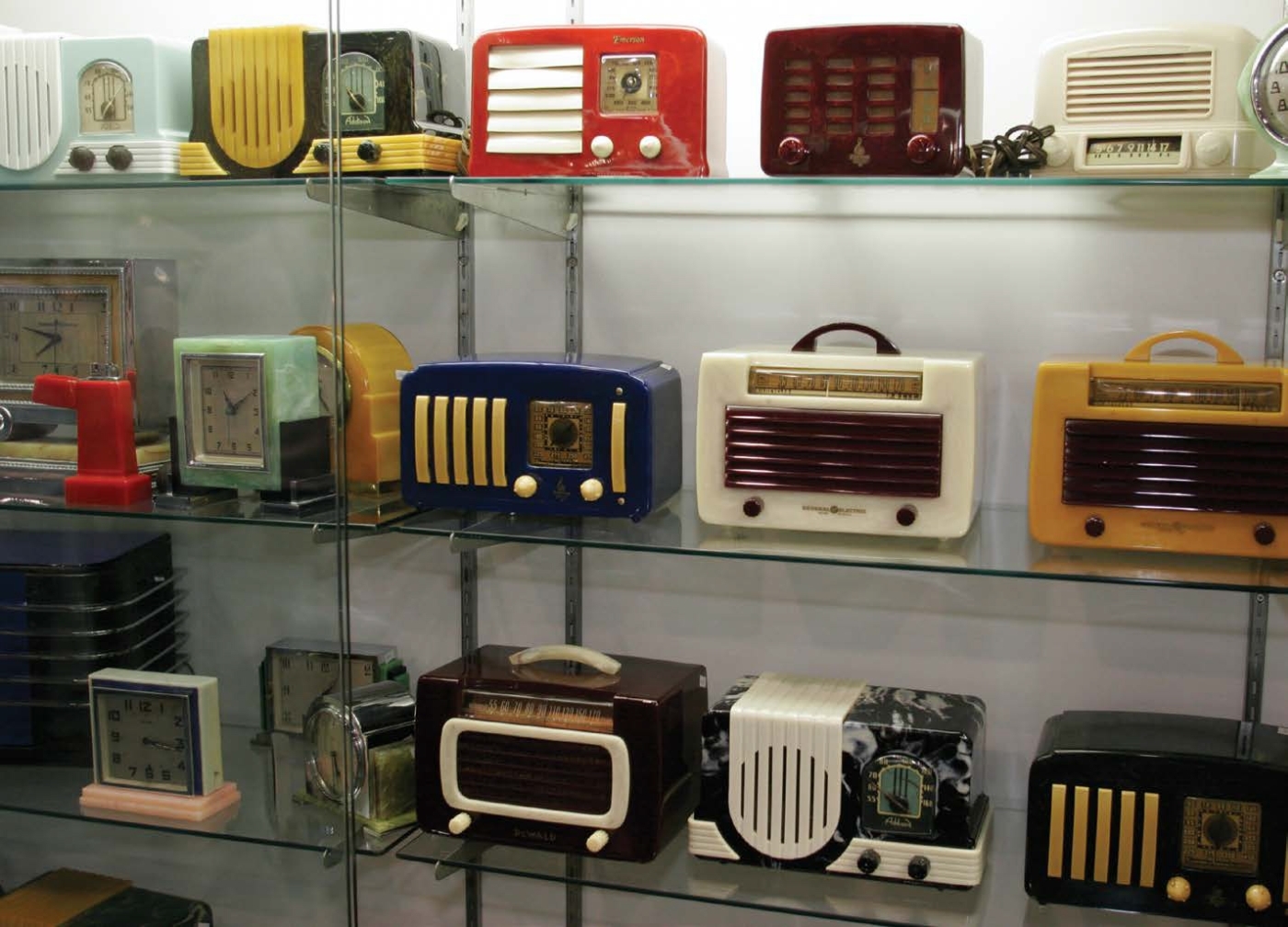 Bakelite products such as these art deco radios and clocks are now considered - photo 6