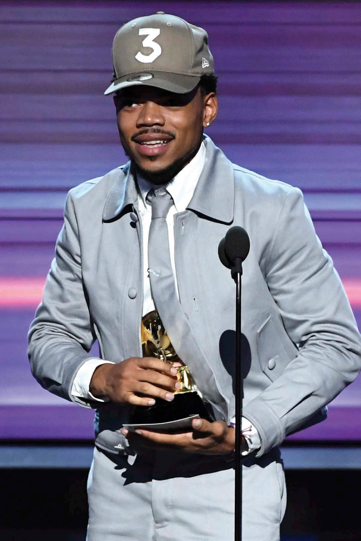 Chance makes his thank-you speech at the 59th Grammy Awards after winning for - photo 7