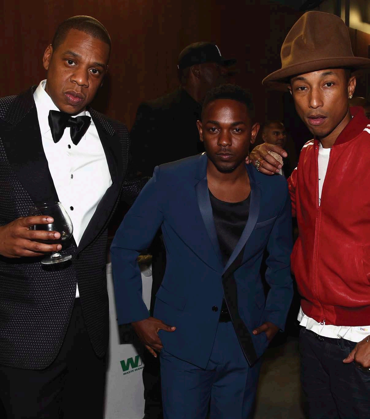 Jay-Z left Pharrell Williams right and Kendrick Lamar attend the - photo 7