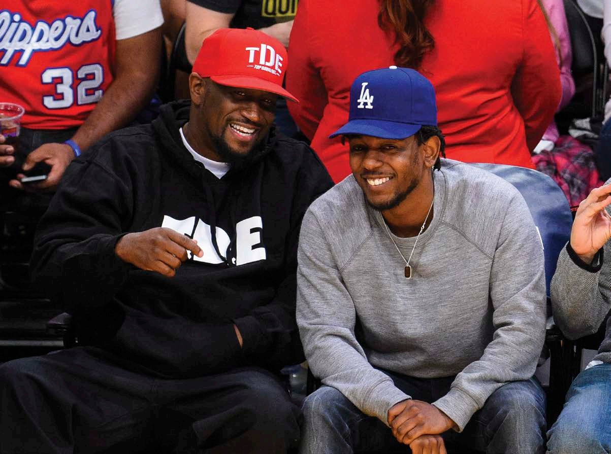 Anthony Tiffith left and Kendrick Lamar hang out at a basketball game in - photo 4