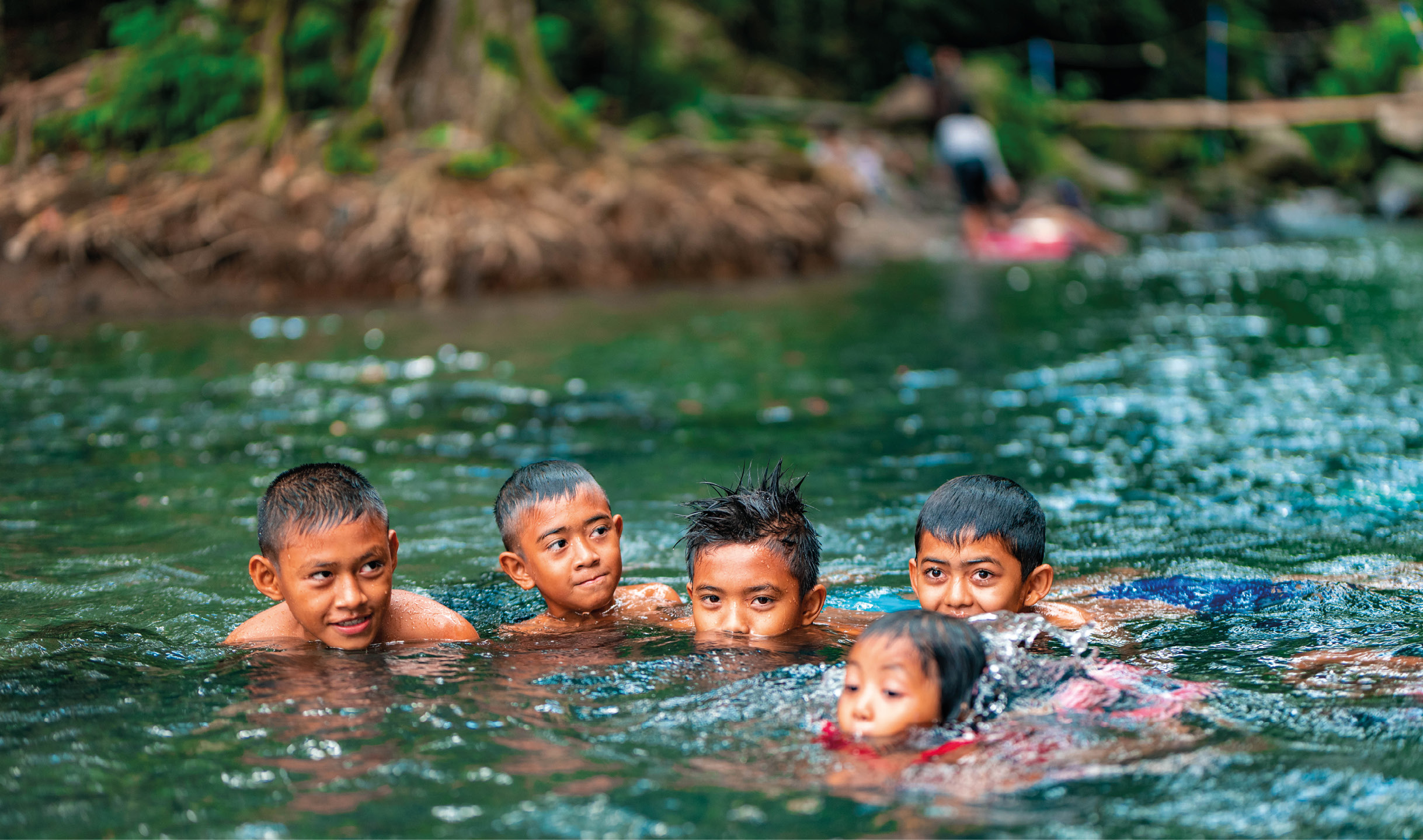 Children enjoying a swim in an Indonesian river ti-jaGetty Images Third - photo 4