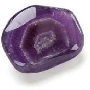 A polished amethyst showing concentric rings formed during the crystals - photo 13