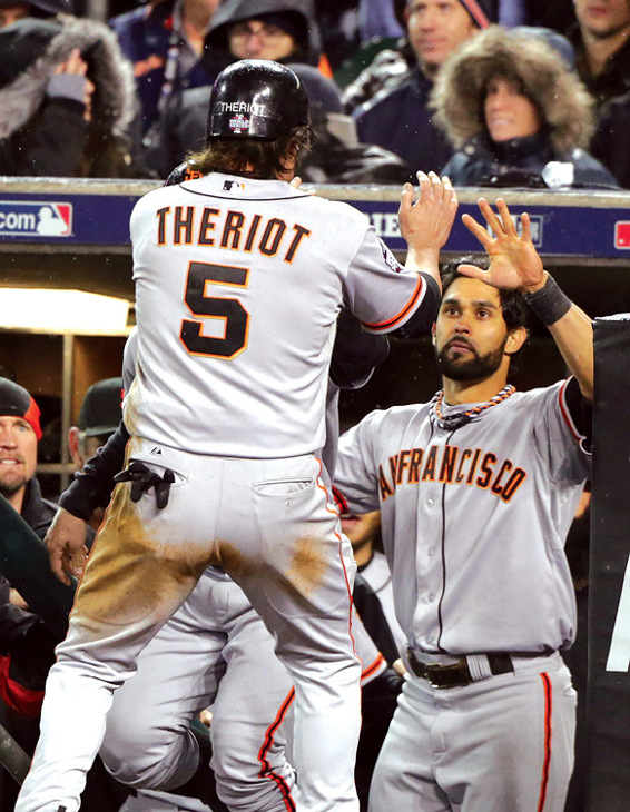 Giants pitcher Sergio Romo lets out a scream after finishing off the St Louis - photo 3