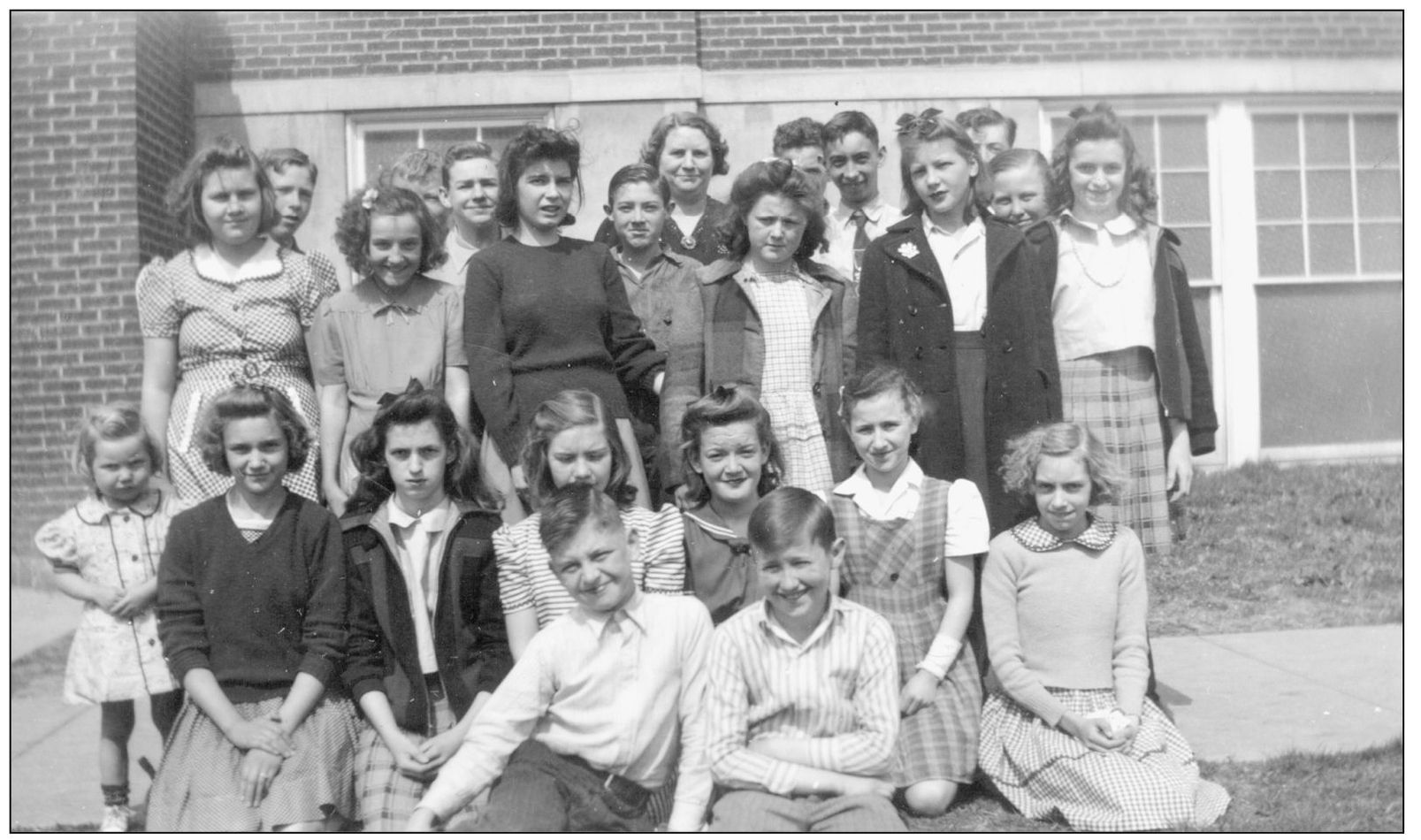 Butler seventh graders pose for a class photograph in 19431944 From left to - photo 12