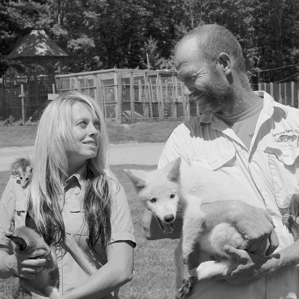 Carrie and Bud taking animals out for an educational talk at the zoo - photo 4