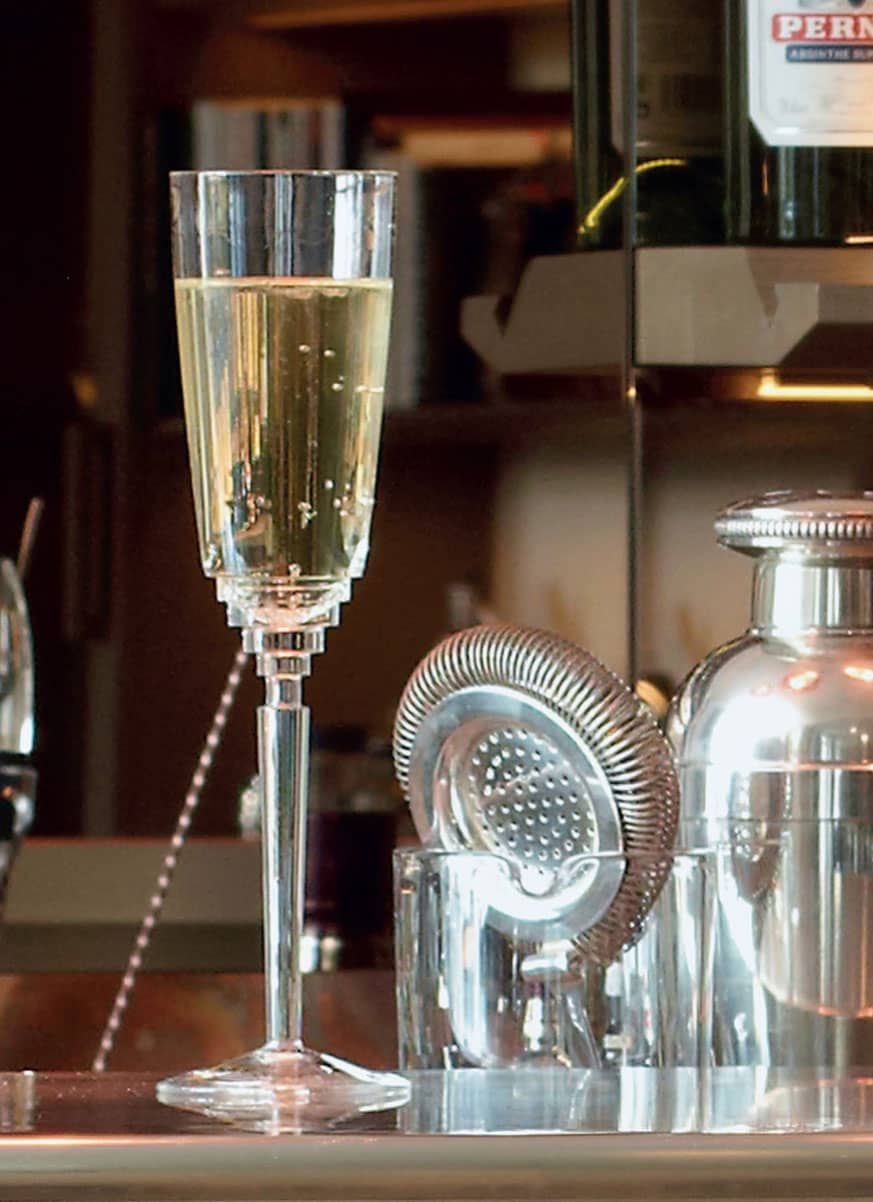 On the zinc-topped counter a gorgeous stepped Art Deco champagne flute sits - photo 9