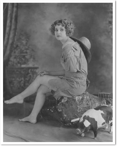 A young woman and her pet pig pose for a photo in the 1920s Going Whole Hog - photo 9