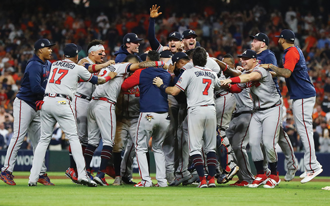 The Braves pile on closer Will Smith during the celebration following the final - photo 6