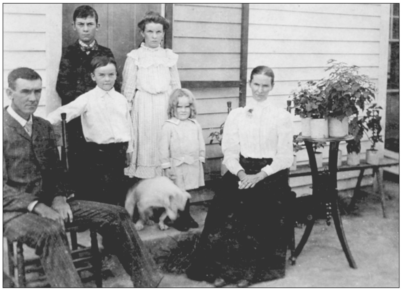 The Frank Smith family is shown outside their home In the early 1900s this - photo 11