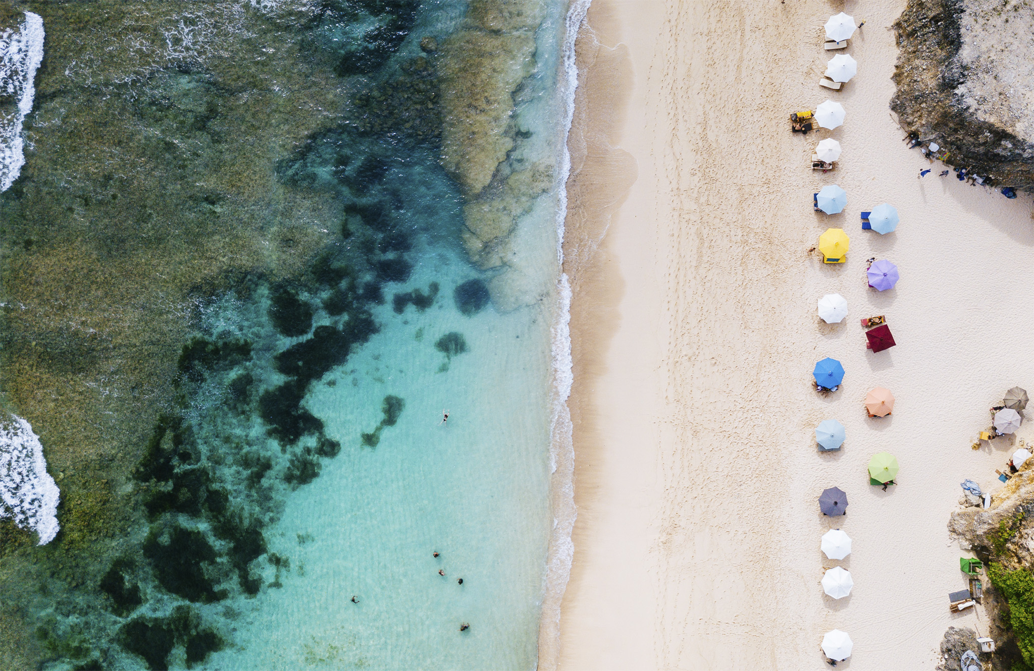 t Beach on Lombok with colourful umbrellas Sun-kissed beaches lapped by - photo 5