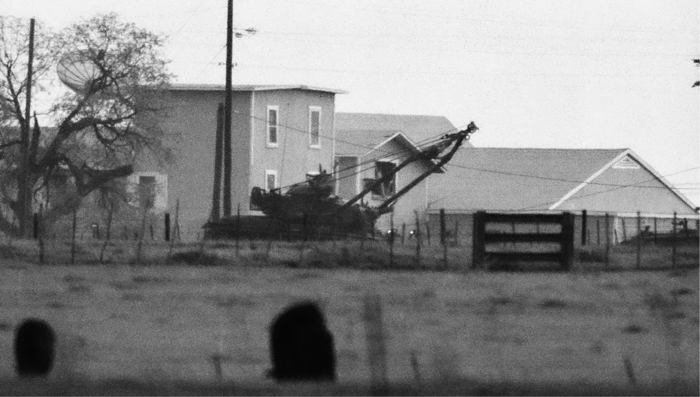 An Army tank driven by an FBI agent deliberately crashes into the rickety wall - photo 16