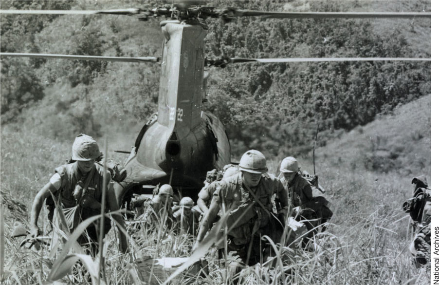 US Marines disembark from a CH-46 Sea Knight helicopter near Khe Sanh - photo 17