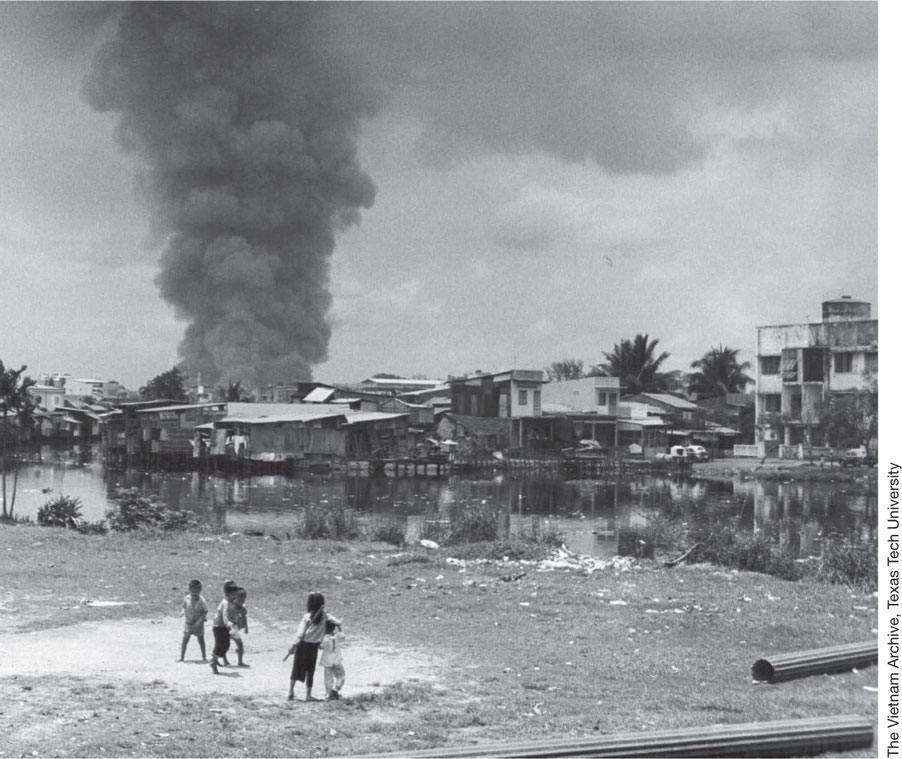 North Vietnamese rockets strike Saigon during the second wave offensive of May - photo 21