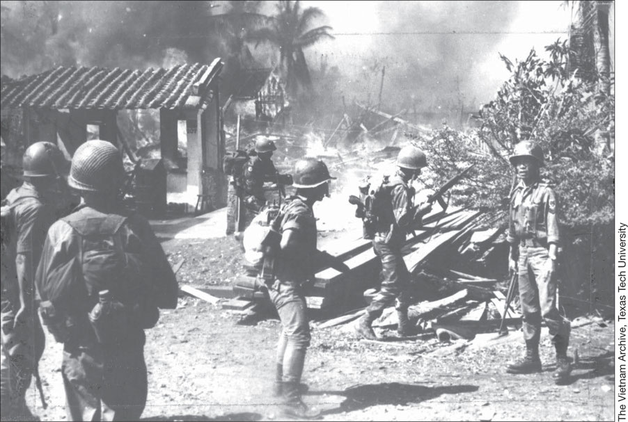 South Vietnamese Rangers search for Communist fighters in Cholon during the Tet - photo 16