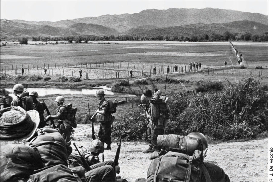 In Operation Pursuit a column of American troops traverses rice paddies near - photo 19