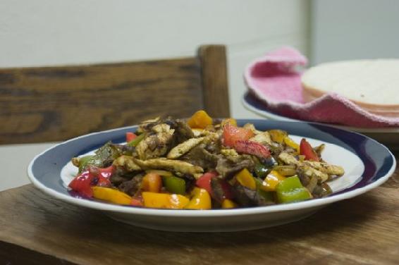 Boneless chicken bell peppers and onion mix with tortillas Serves - photo 7