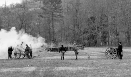 Confederate and Union reenactors portraying the scene at the Siege of - photo 2