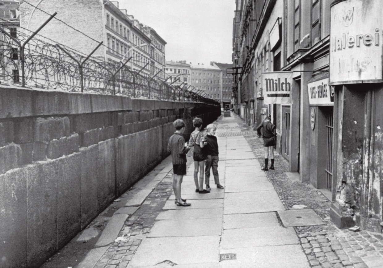 B The Berlin Wall seen here in 1961 was a guarded concrete barrier that - photo 8