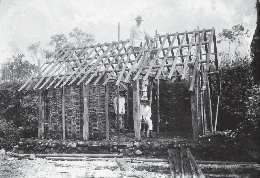 FIGURE 01 Photograph of five individuals at a house being improved at Tjapar - photo 3