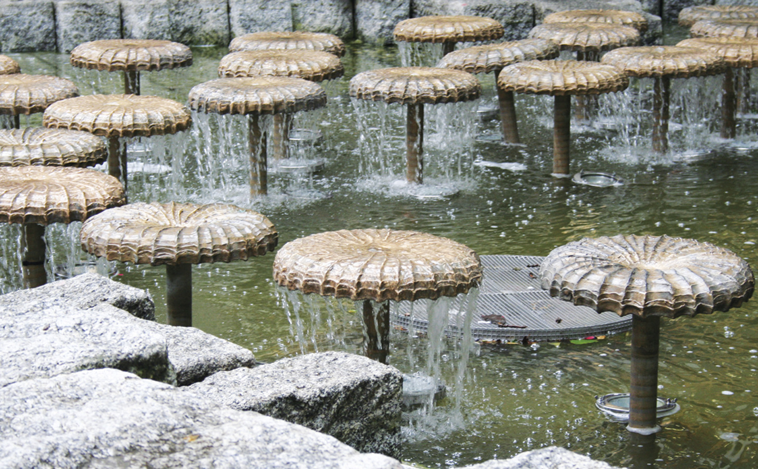 The mushroom water fountains by Frauenkirche a popular place to cool off in - photo 4