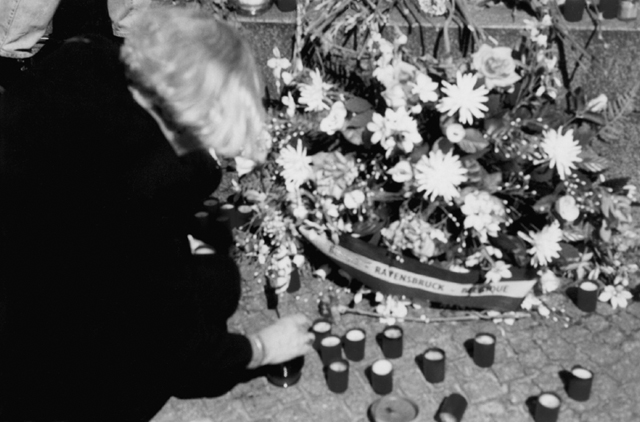 The author lighting a memorial candle in Ravensbrck in 1995 Say the Name A - photo 1