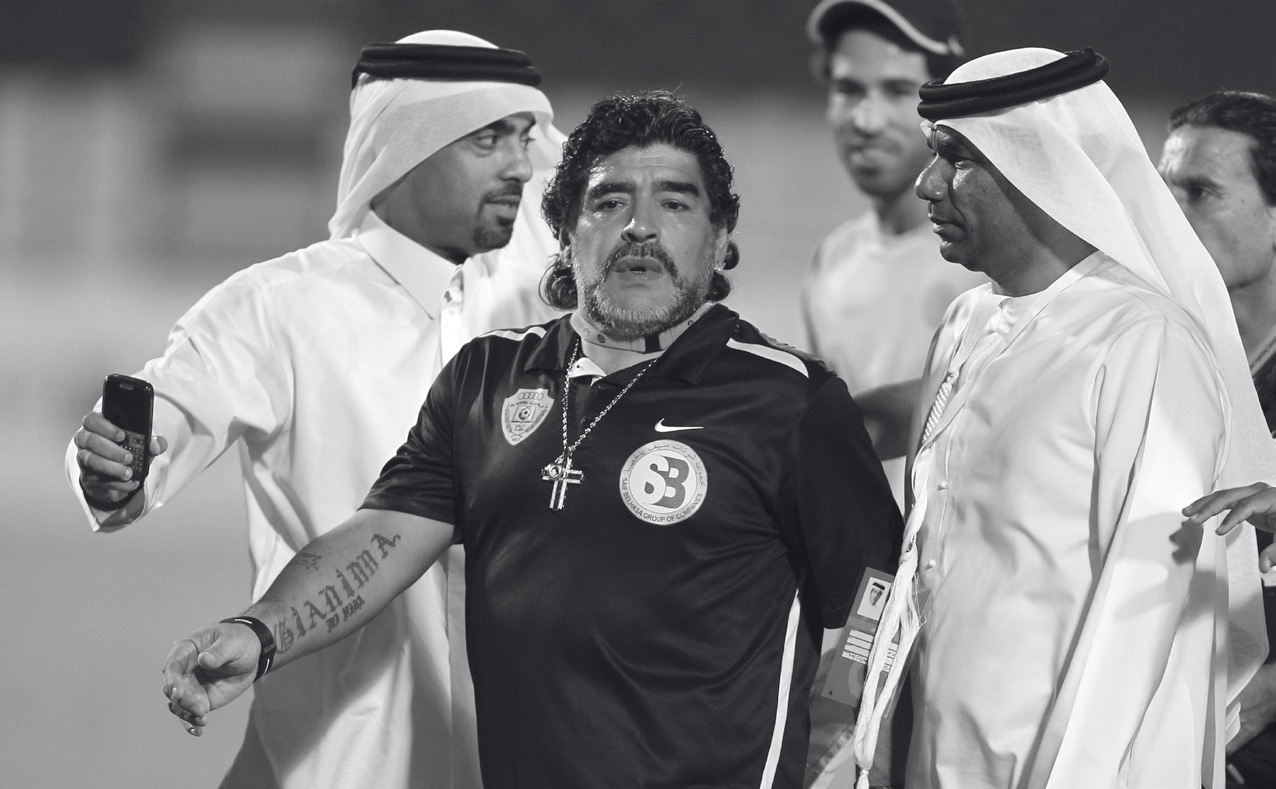 Surrounded by fans after a GCC Champions League victory for Al-Wasl 30 May - photo 18