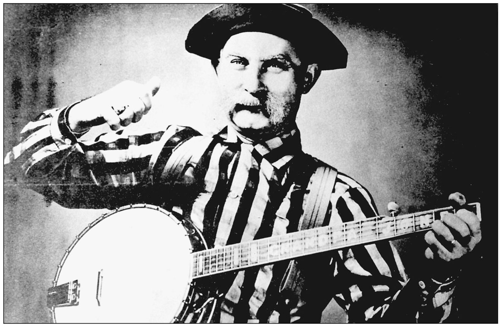 Louis Grandpa Jones a Kentucky native who grew up in Akron strums his - photo 7