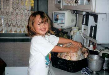 My daughter Angela preparing the Thanksgiving turkey 1998 Family - photo 5