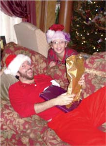 Angela and my son Erik opening gifts Christmas morning 2008 Angela and - photo 8