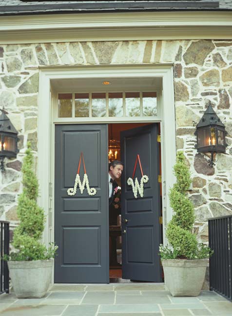 Father of the bride peeping out the front door just before walking his daughter - photo 5