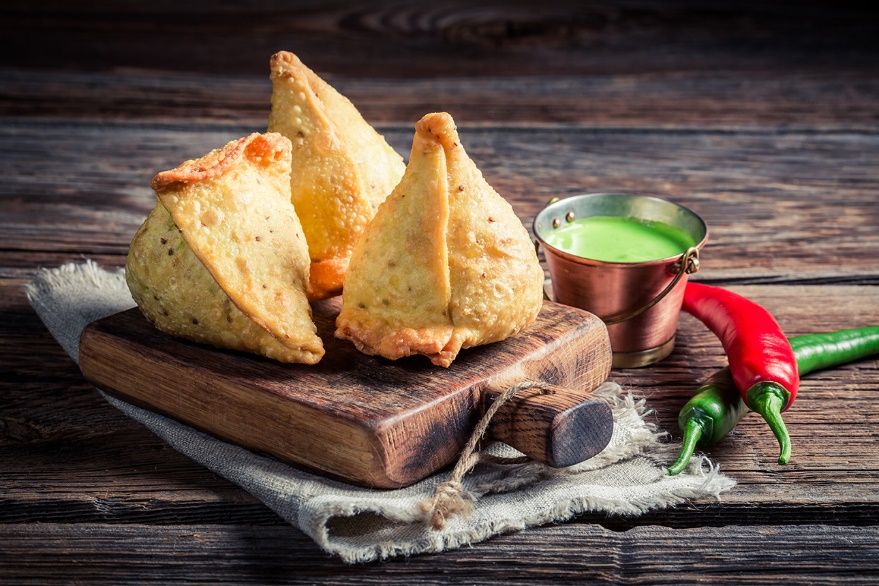 A samosa is an oil fried pastry with delicious fillings like mashed and spicy - photo 3