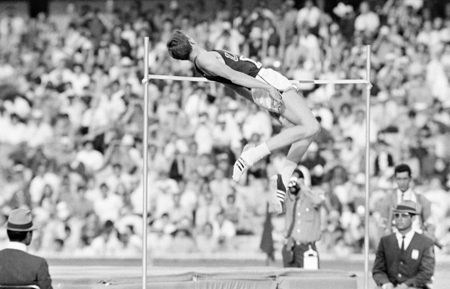Flopping to the Top Dick Fosbury used his signature Flop clearing the bar - photo 9
