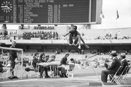 BOB BEAMON SETS THE LONG JUMP WORLD RECORD AT THE 1968 MEXICO CITY OLYMPICS How - photo 4