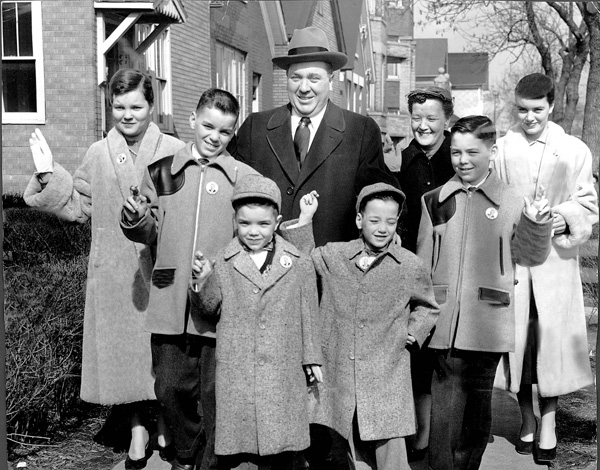 Near the Daley home Richard J Daley and his family walk to the polls for his - photo 3