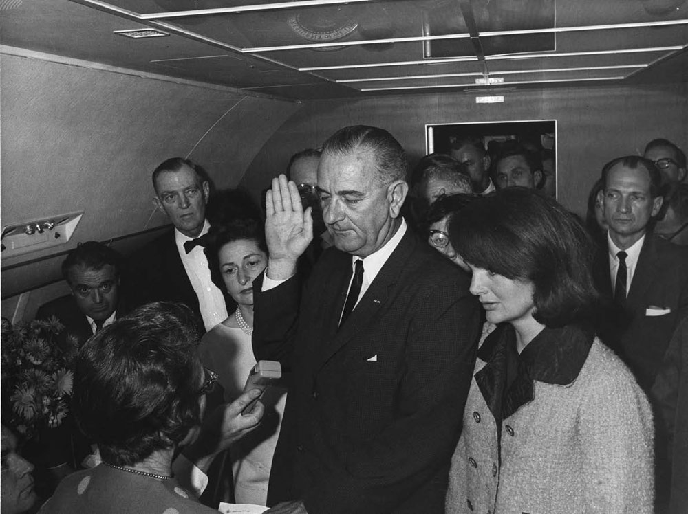 Vice President Lyndon B Johnson was sworn in as president minutes after - photo 8