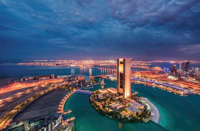 This aerial view of Manama shows the Four Seasons Hotel and Bahrain Bay at - photo 5