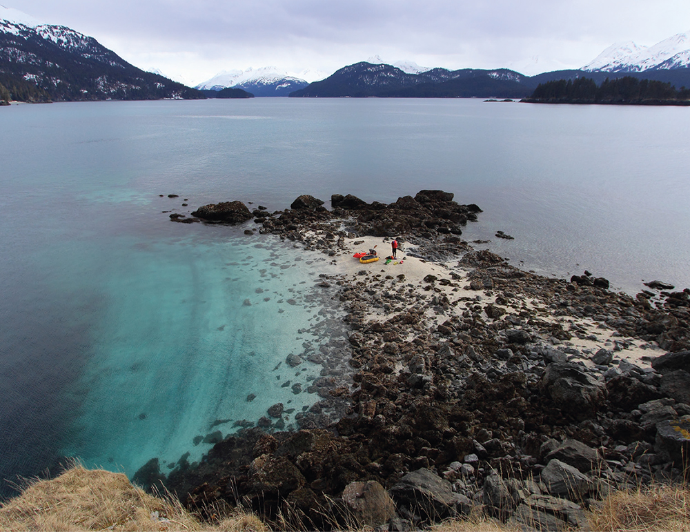 We take a paddling break on a white beach made of barnacle shells in the - photo 6