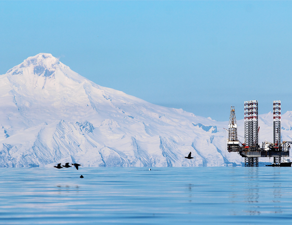 Still snow-covered in late April Mount Iliamna towers over Cook Inlet and an - photo 13