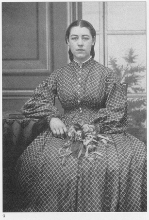 c186166 A typical young lady of the era wearing a fashionable but very - photo 9