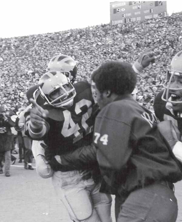 Wolverine Billy Taylor celebrates the game-winning touchdown in the 1971 - photo 5