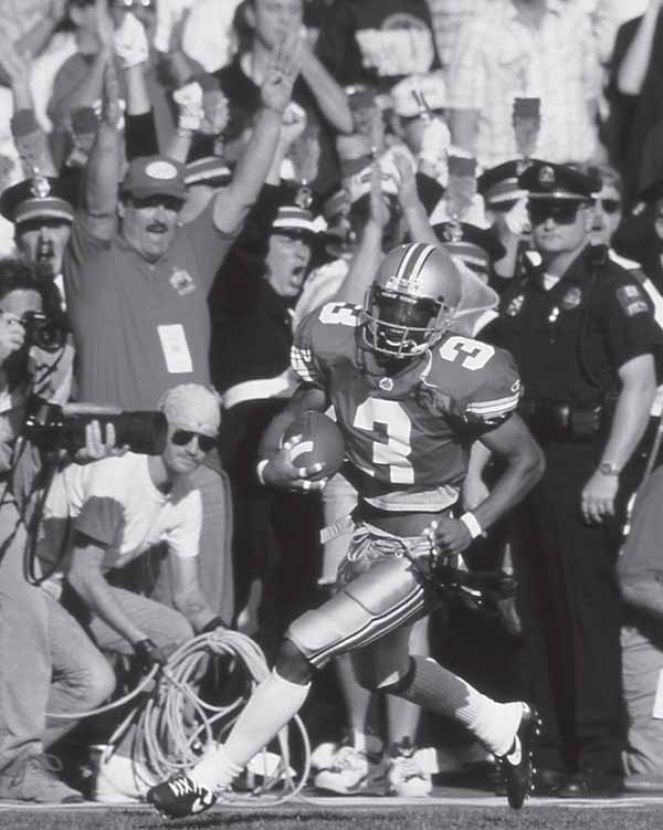 Ohio State Buckeye receiver Dimitrious Stanley runs after making a catch in the - photo 6