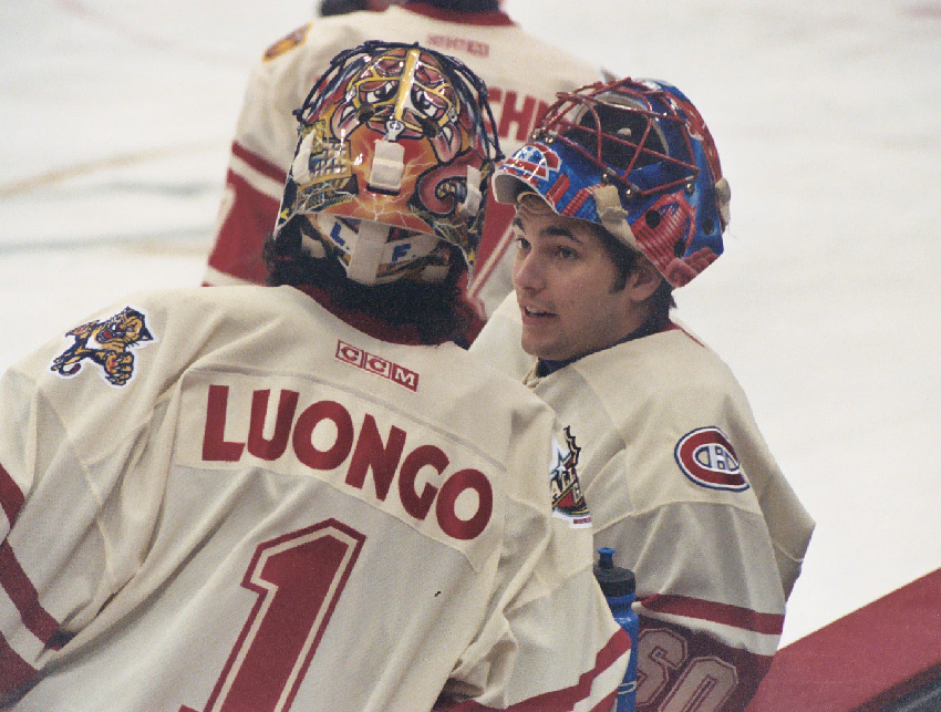 Roberto Luongo of the Panthers chats with Jose Theodore of the Canadiens during - photo 13