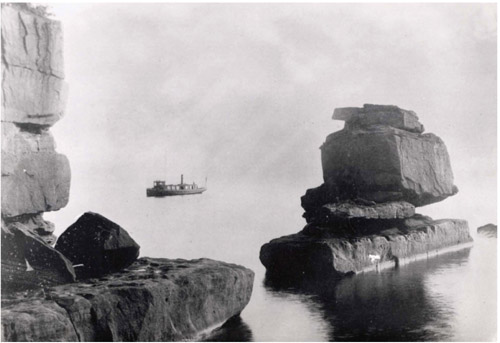 Rock formation known as The Sphinx off Stockton Island with the steamer Edna - photo 2