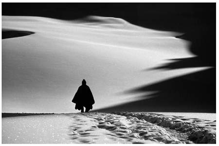 A man descends a glacier after making offerings to the mountain gods during the - photo 6