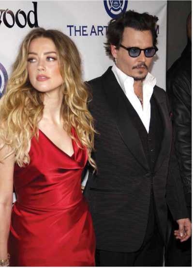 Johnny Depp has faced allegations of abusing his ex-wife Amber Heard and she - photo 4