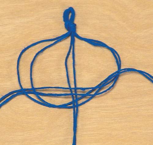 3 To complete the square knot fold the right strands over the centre strands - photo 5