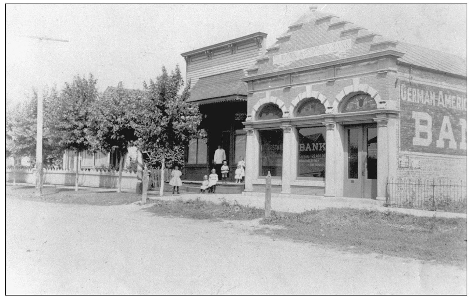 GERMAN AMERICAN BANK AND ADAMS BARBER SHOP Rudolph Adams established his - photo 11