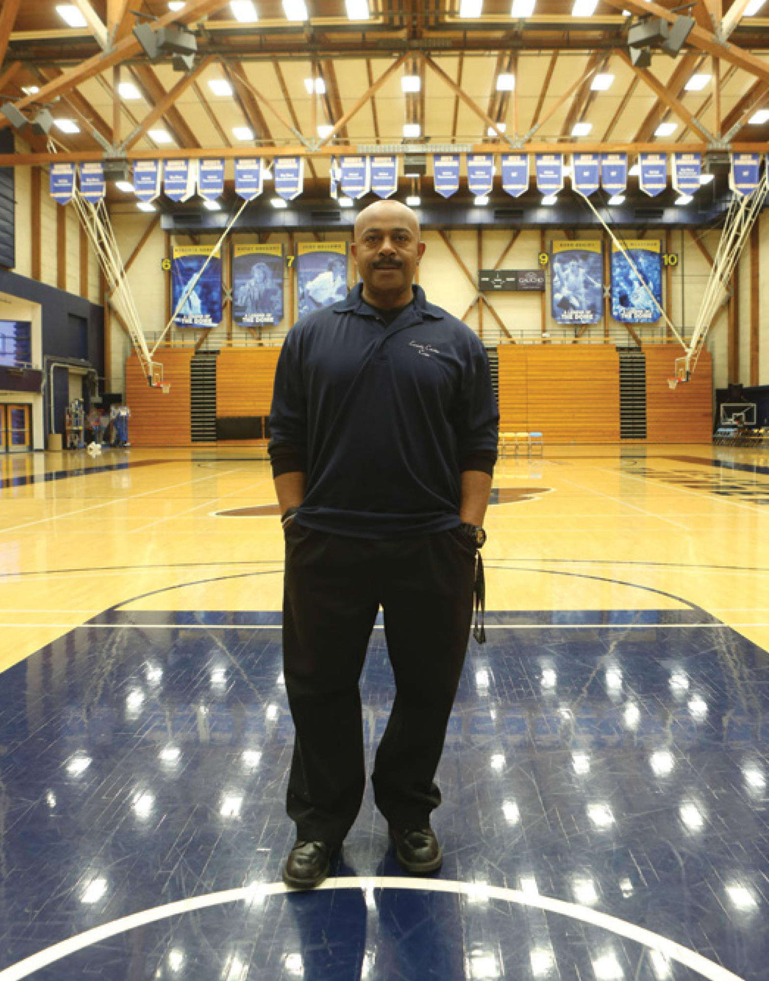 A fan walks into the Thunderdomethe Events Center on the campus of the - photo 13